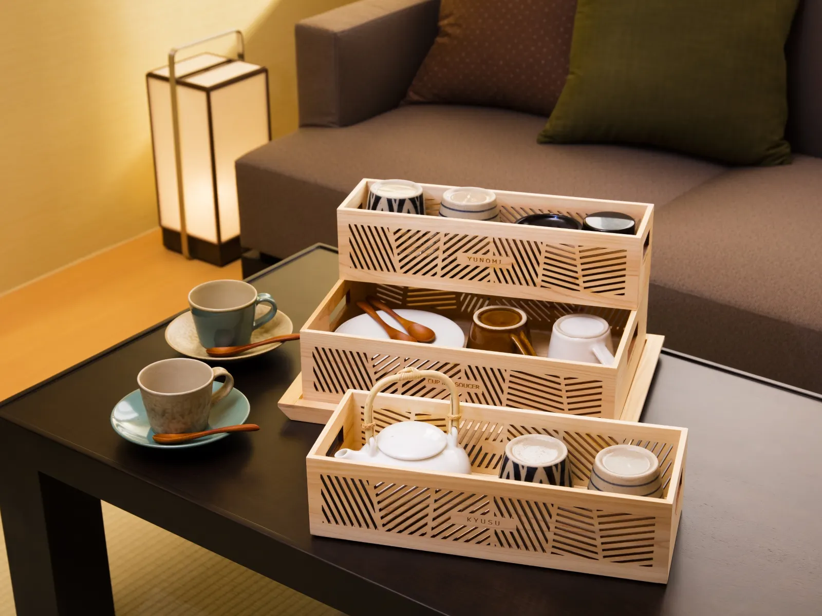 Welcome tea set with regional pottery arranged on a lounge table