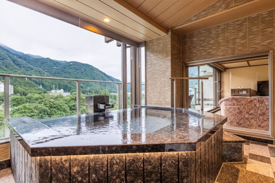 Gorge-view open-air stone bath on a terrace