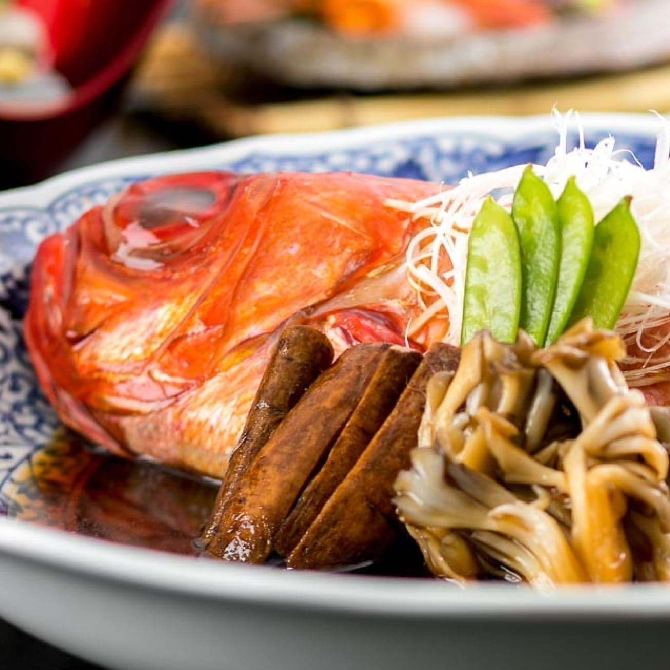 Simmered whole kinmedai (golden eye snapper) dish served at Hotel Kanichi