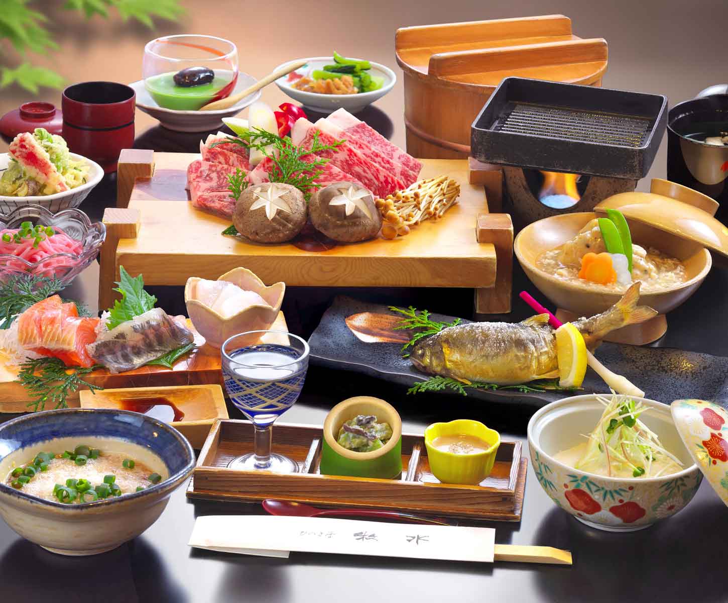 Multi-course kaiseki dinner with marbled wagyu beef, river-fish sashimi and tabletop grill
