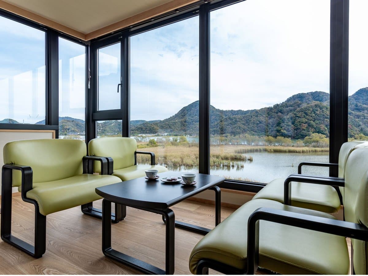 Japanese-style guest room at Oyado Seri with tatami and riverside windows