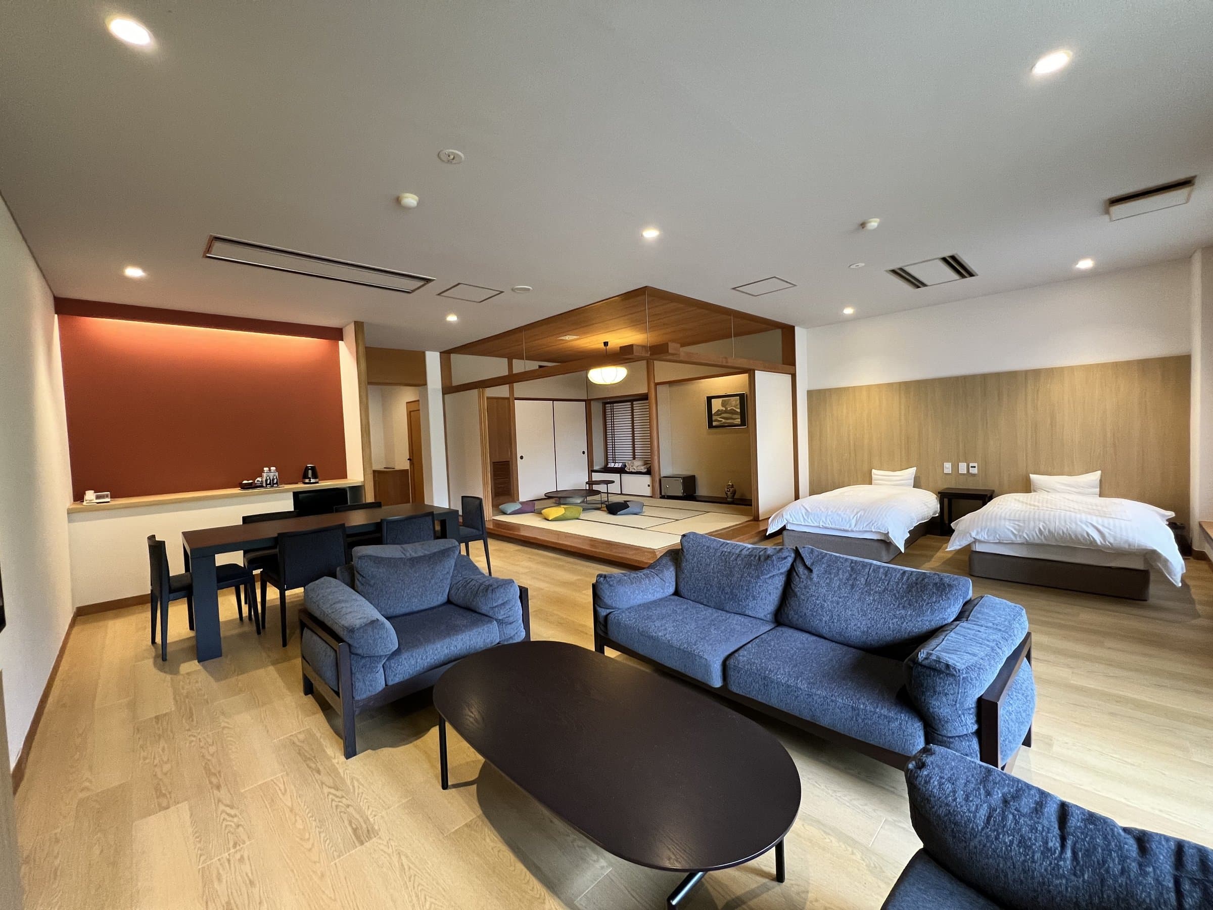 Yusai large special suite with living area, sofas, dining table and separate tatami room