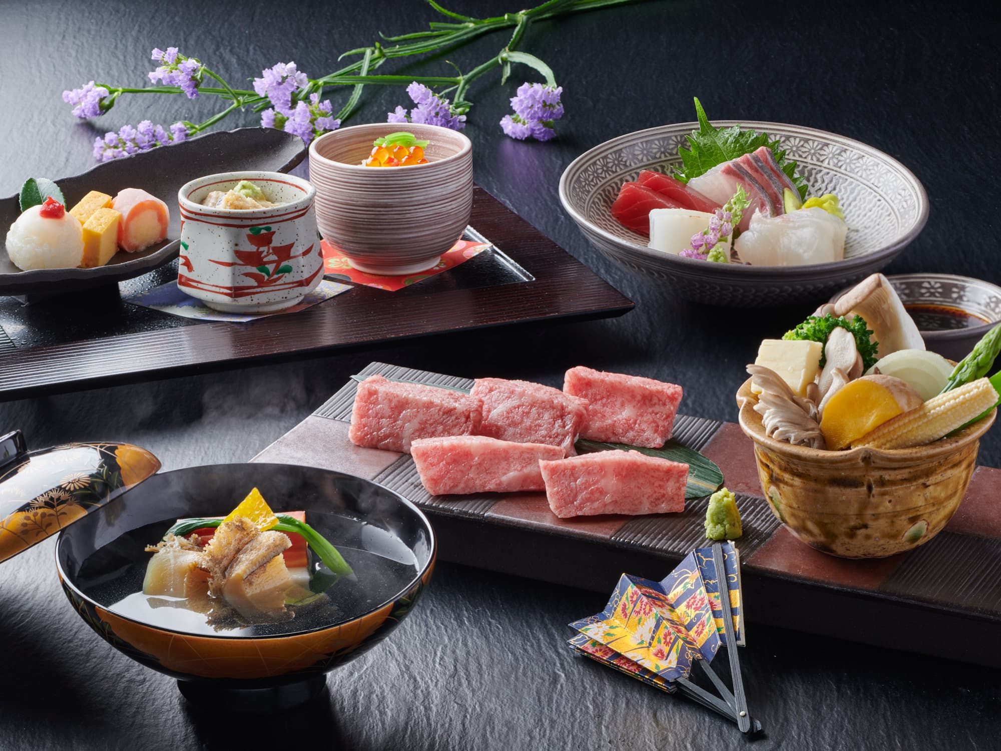 Kaiseki dinner spread featuring marbled Hida beef, sashimi and seasonal small dishes, Yamagataya, Gero Onsen