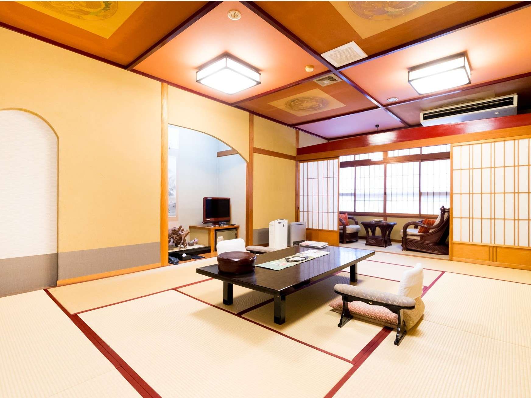 Yumekoyado Tenbouen Kinosaki Onsen spacious tatami guest room with low table and seating area