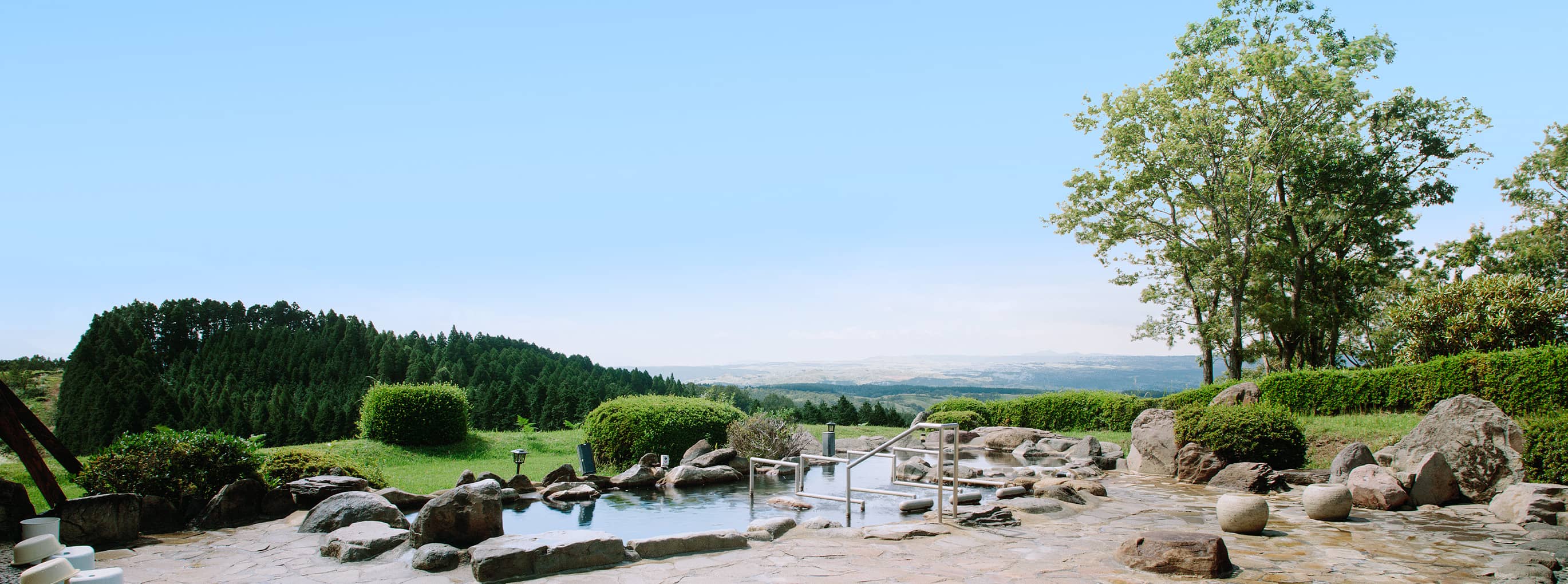 Wide open-air rotenburo with panoramic highland view at Senomoto Highland's Hotel