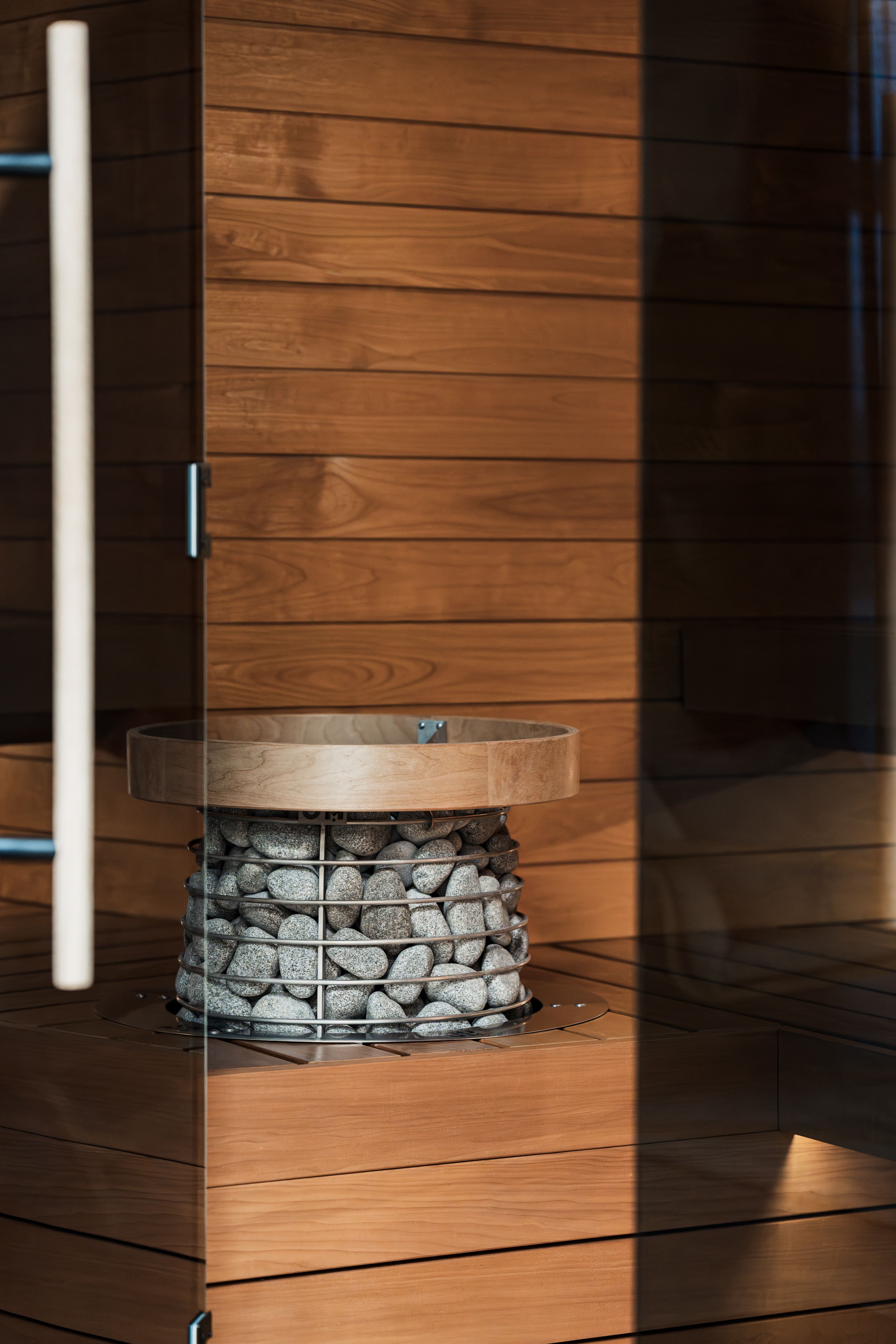 Contemporary wooden sauna interior with clean wooden panel walls and minimal design