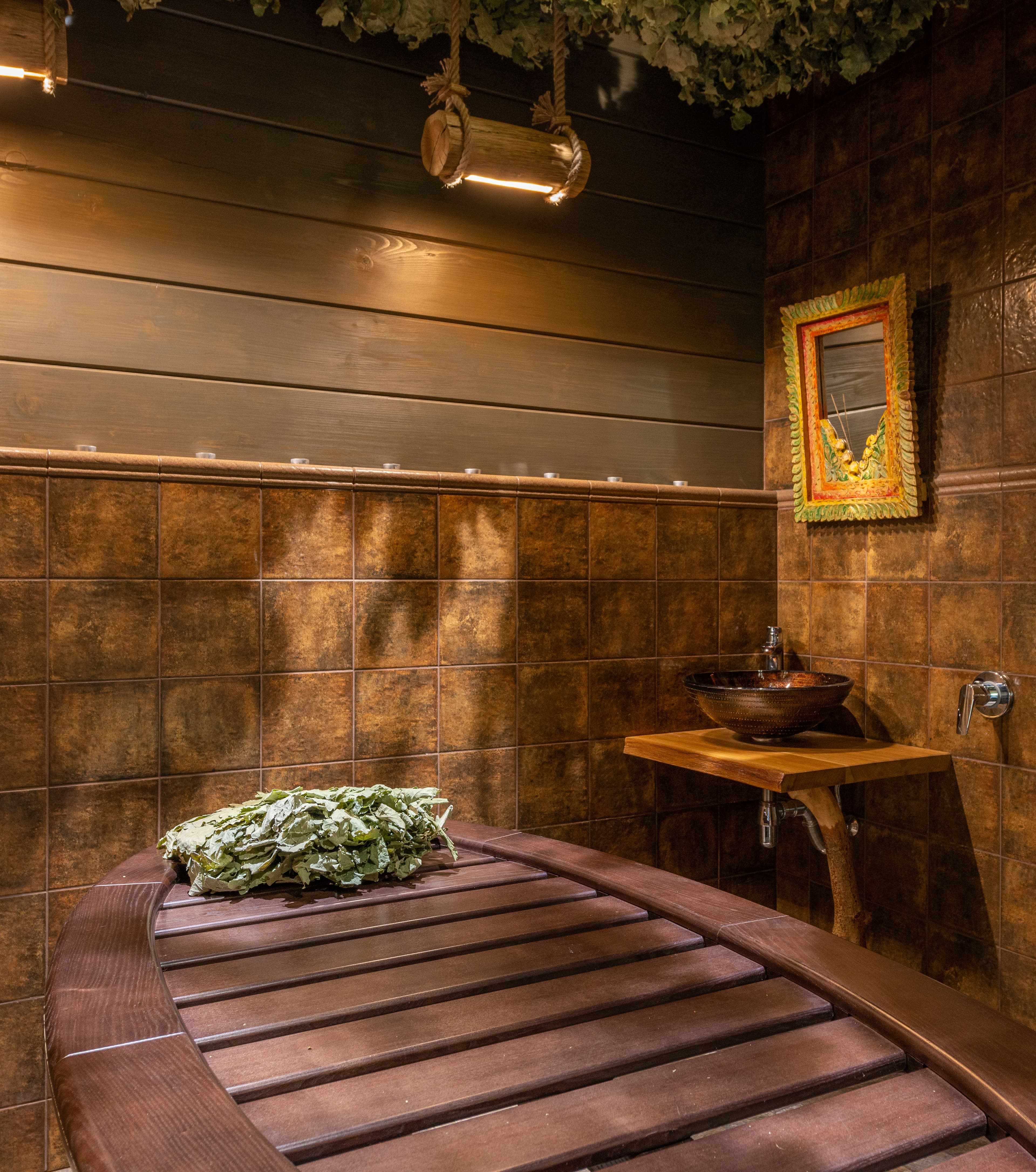 Luxurious spa room with warm wooden elements and spa furnishings creating an inviting atmosphere