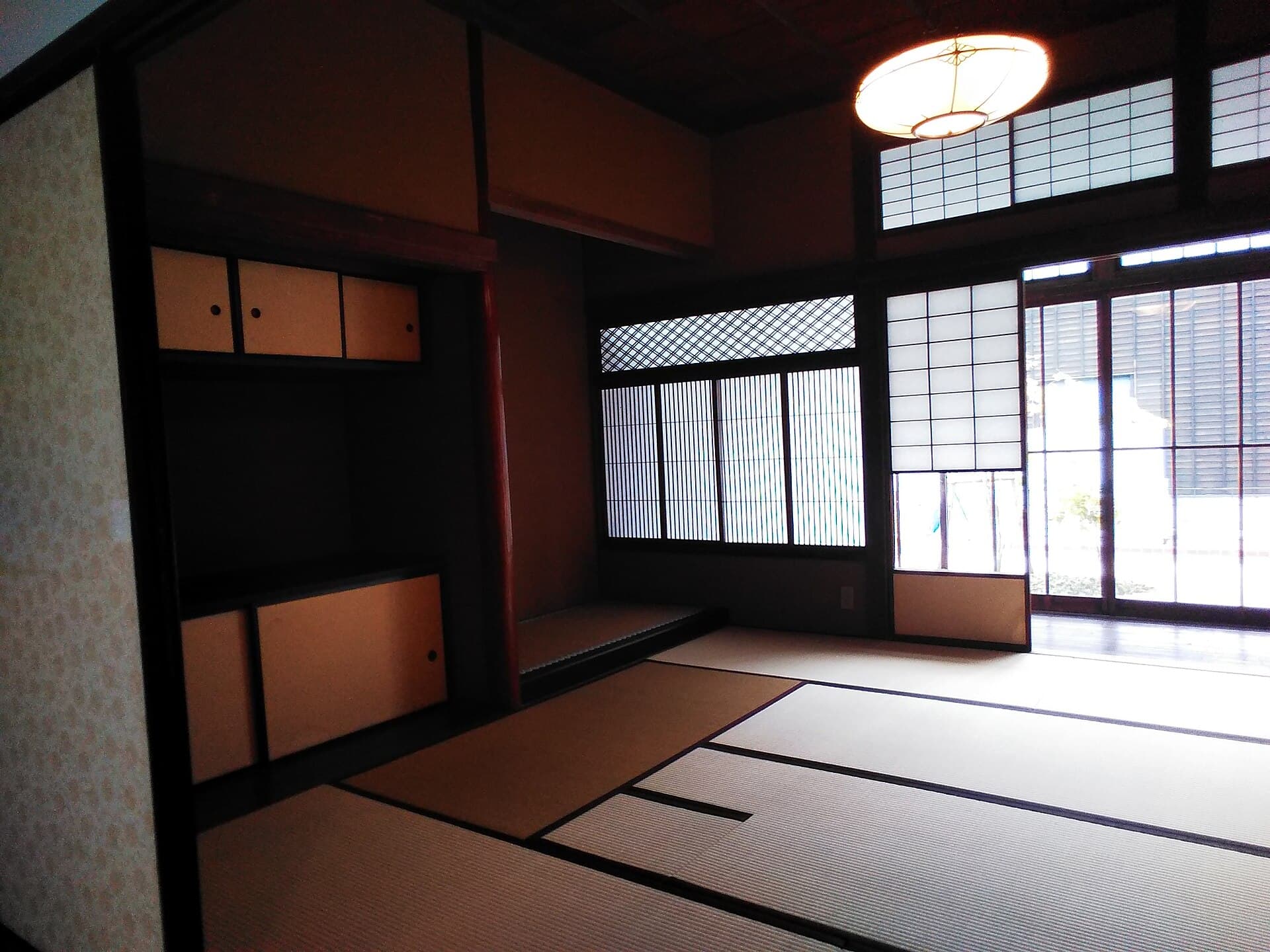 A kaiseki meal with multiple small Japanese dishes including grilled fish and pickles
