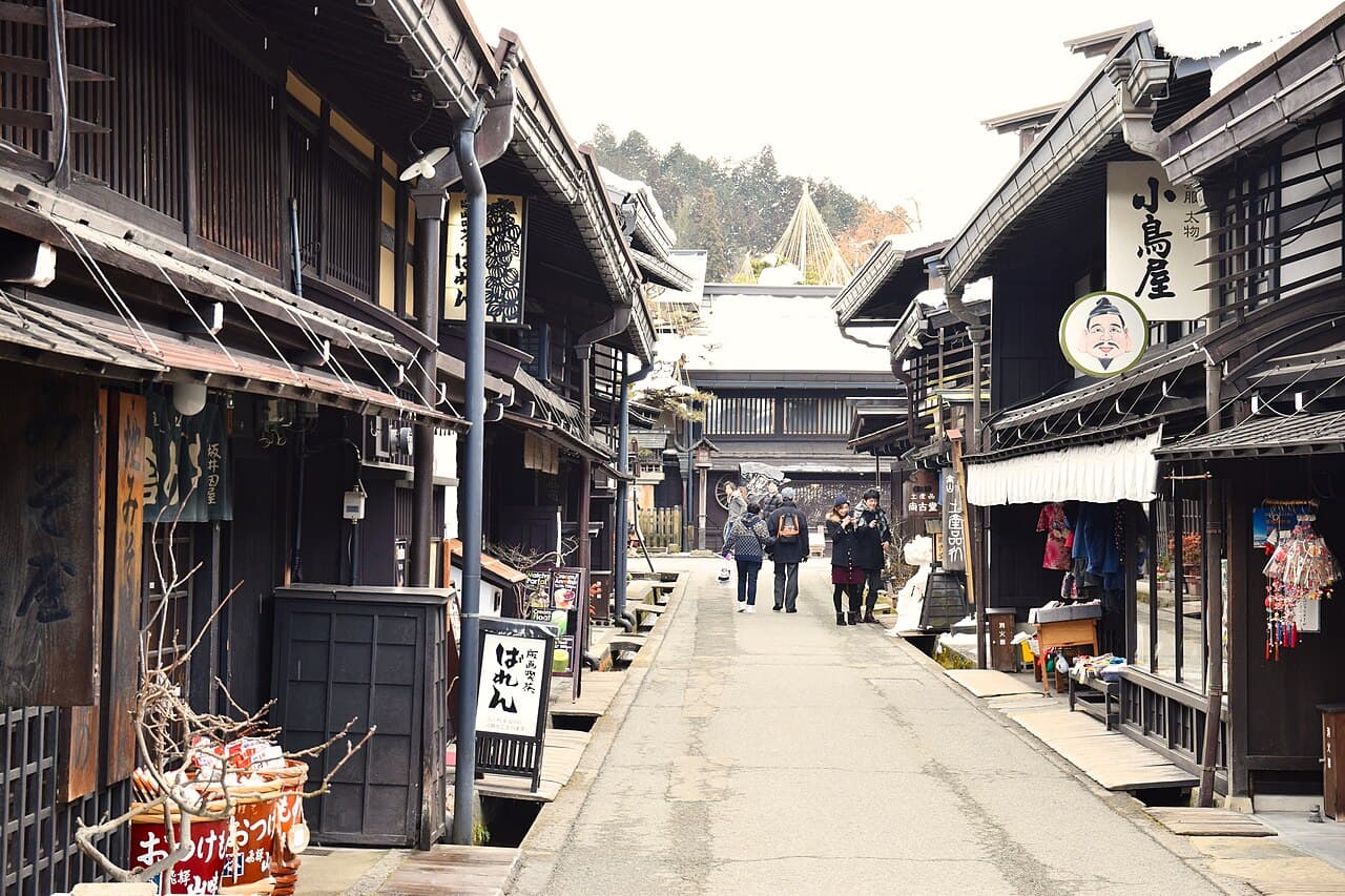 Hida Takayama Sanmachi Suji historic district with traditional wooden merchant houses and latticed windows