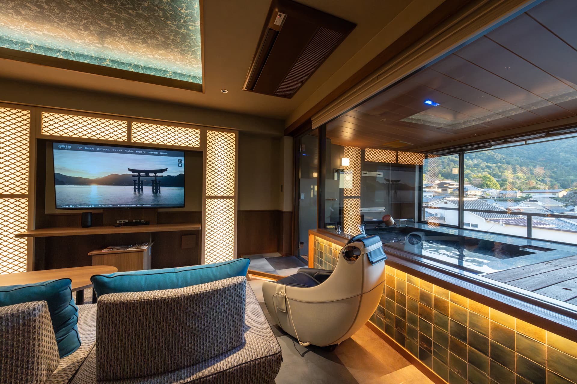 Premium guest room at Kinsuikan with lounge seating, private bath and a view of Itsukushima torii