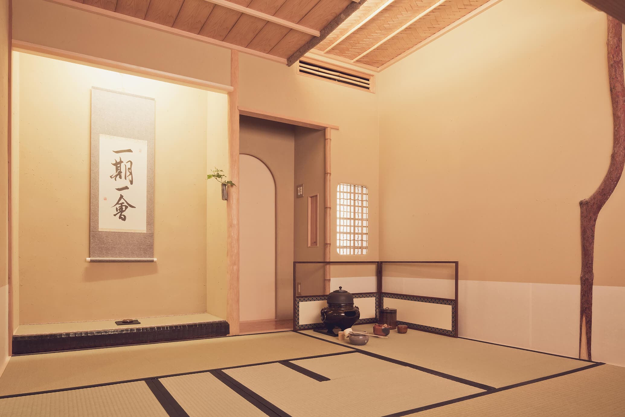 Tea ceremony room at The Edo Sakura with tatami, hanging scroll and tea hearth, Tokyo